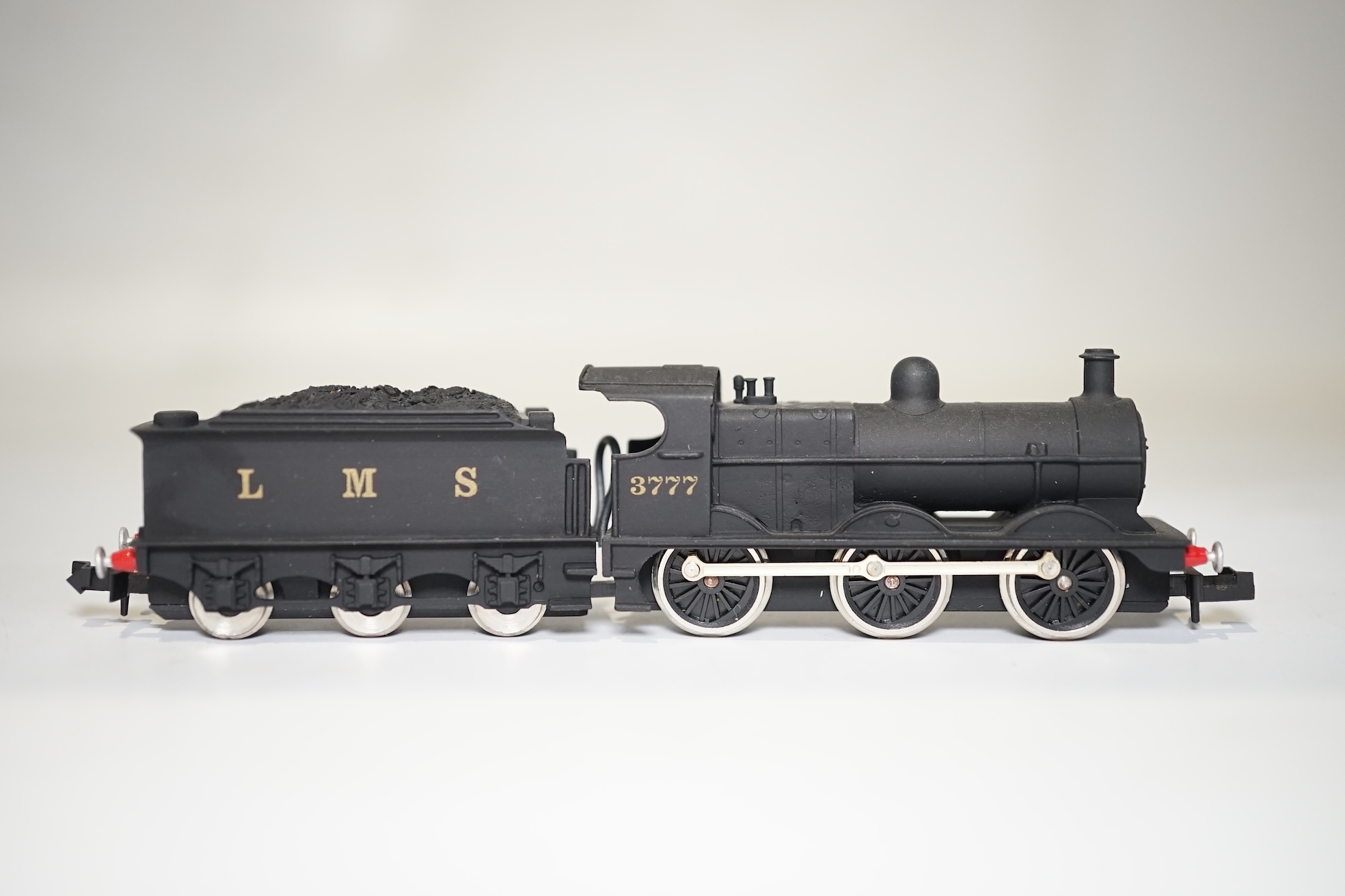 Three boxed Union Mills N gauge railway LMS tender locomotives; a Class G2, 9032, a Class 3F, 3777, and a Class 7F, 9504. Condition - good.